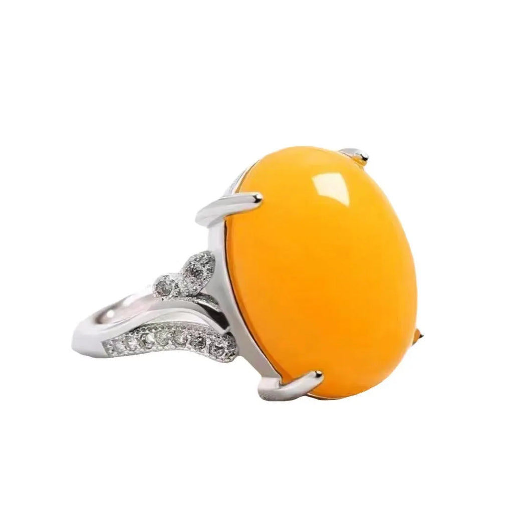 Adjustable ethnic geometric alloy ring showing five colour variations: black, blue, green, red, yellow