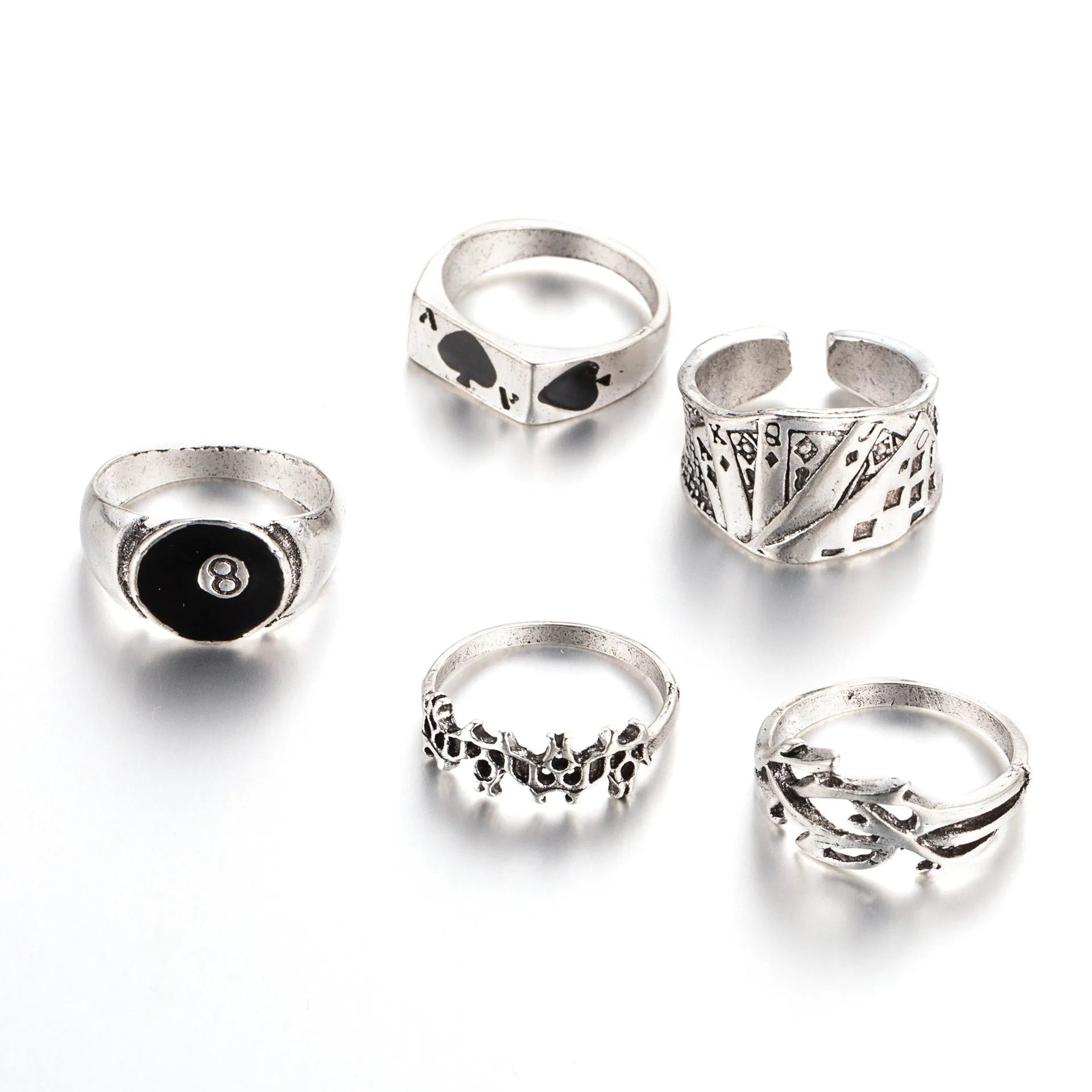 Black alloy ring featuring a detailed retro spade card design on an adjustable band.