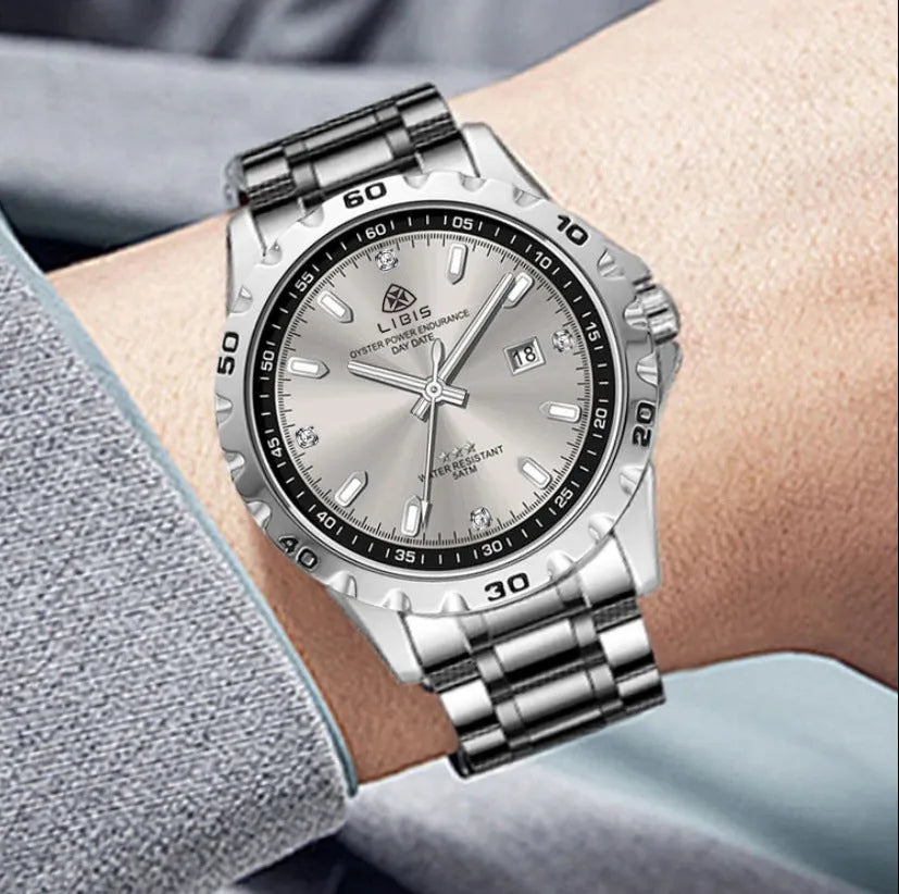Men's silver case quartz watch with stainless steel strap and luminous hands on black or grey dial