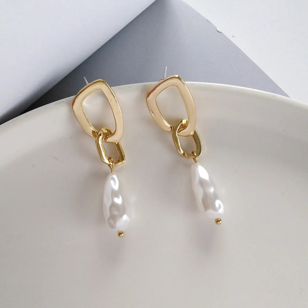 Gold copper irregular French pearl pendant earrings with a geometric shape for women