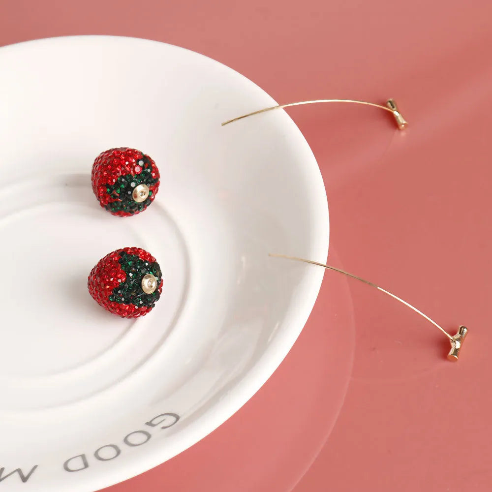 Pair of women's geometric strawberry charm earrings in zinc alloy, spot drill red finish.