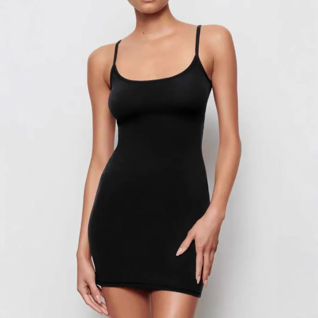 Black sleeveless sling sheath dress with skinny fit and mid-waist