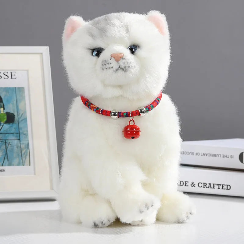 An adjustable ethnic-style pet collar with a metal buckle and bell, shown in various colours.