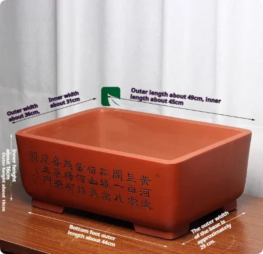 Purple clay Chinese style flower pot with plant on desktop, available in multiple colours and sizes