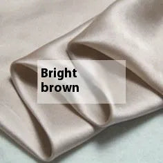 Solid colour silk duvet cover laid flat, showing plain weave texture in a choice of six colours.