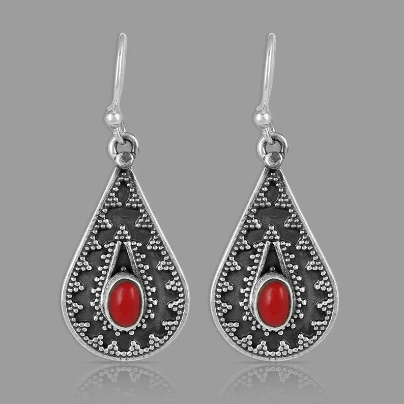 Silver drop earrings with red pine gemstone detail in European style