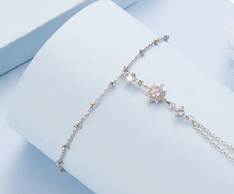 S925 sterling silver integrated ring and bracelet set with eight-pointed star ornament on white background