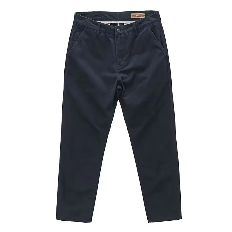 Men's slim fit casual trousers in grey with a straight leg design, made from a micro-elastic fabric blend.