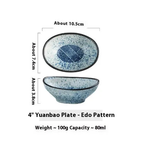 Oval-shaped Japanese ceramic sauce dipping bowl with an underglaze decorative pattern.