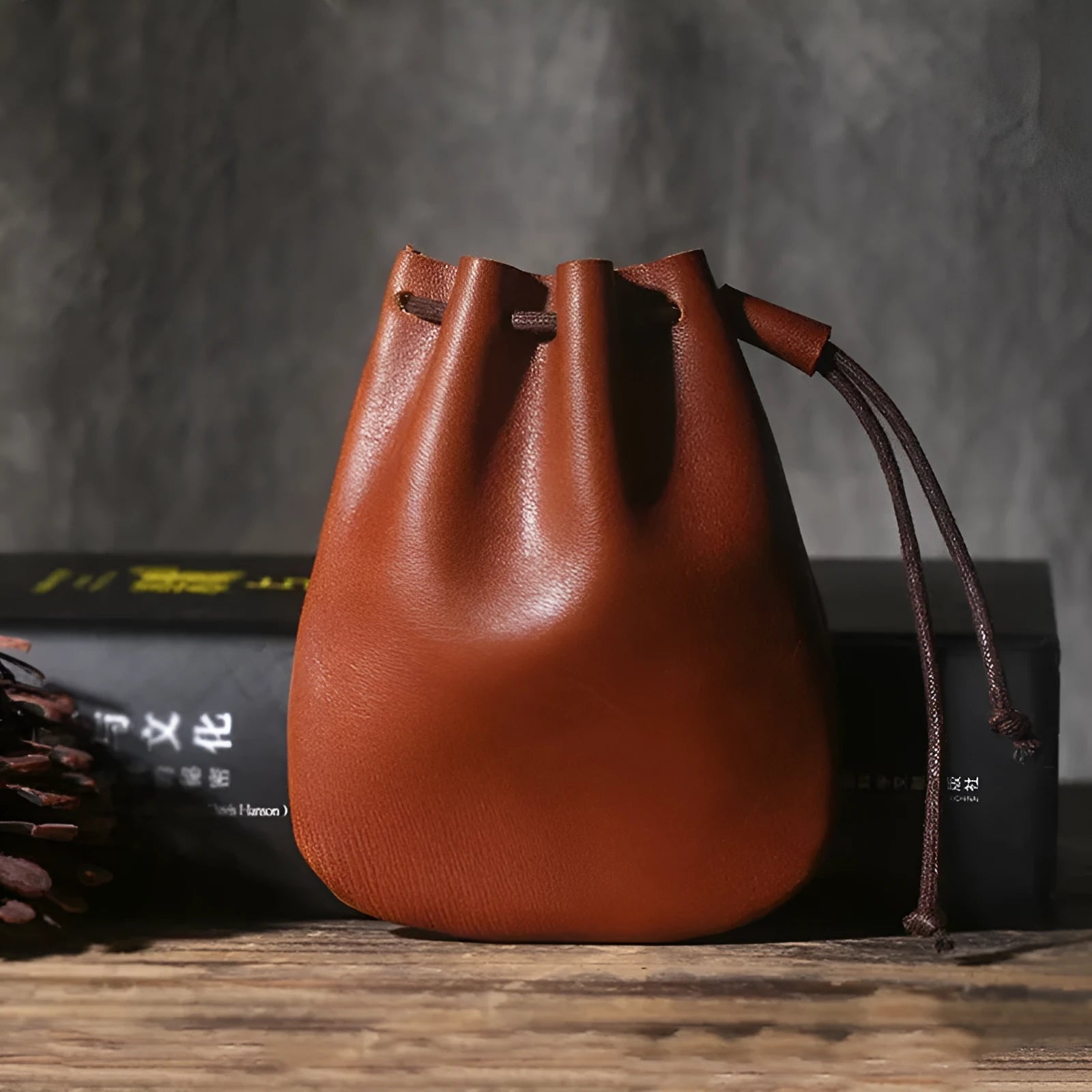 Vintage cowhide leather drawstring wallet in retro style showing two size options