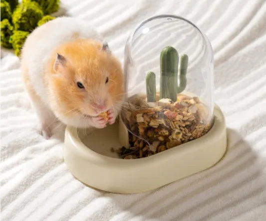 Hamster automatic cage feeder with transparent food window in vanilla yellow colour.