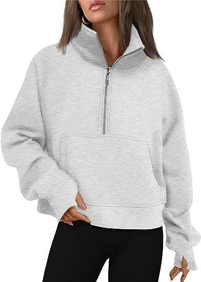 Loose lapel fleece-lined women's sweater in a solid colour, shown with raglan sleeves.