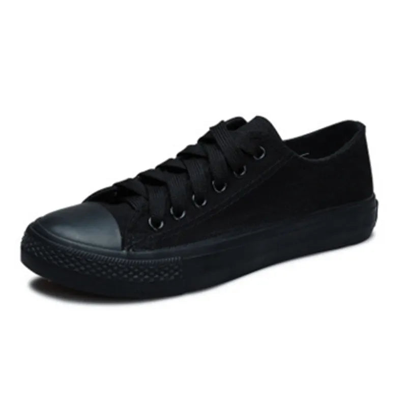 Women's solid colour canvas casual shoes shown in black, white black, white red, and all black options.