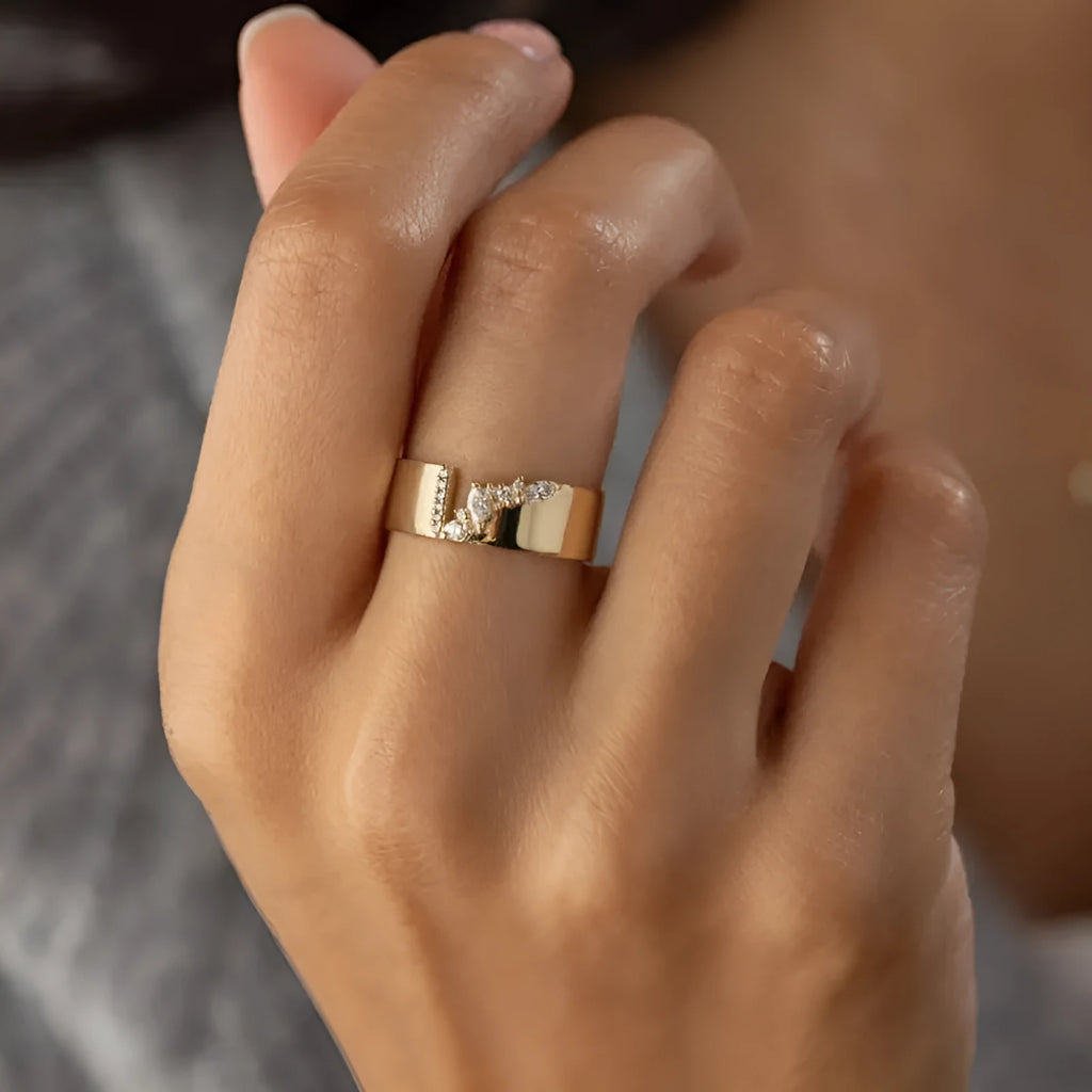 Gold electroplated women's copper ring with shining zircon details showing personality style