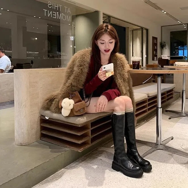 Black round toe chunky heel knee high boots with back zipper fastening