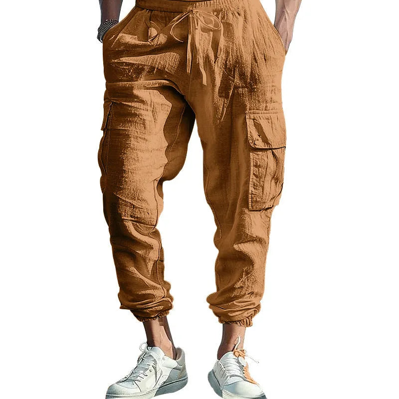 Men's casual linen trousers in solid colour with ankle ties and multiple pockets, loose fit, drawstring waist.