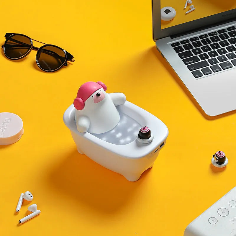 White plastic USB desktop air humidifier and essential oil diffuser on a wooden table.