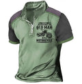 Men's casual lapel polo shirt with digital letter print and zipper decoration detail on sleeve.