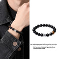 Black obsidian and pure silver prayer wheel bracelet for men with hand-woven construction