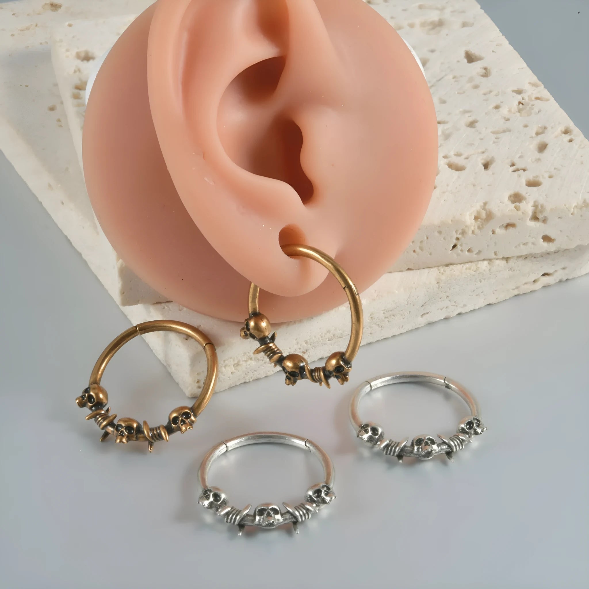 Copper punk earrings with ghost head designs in antique gold and silver vintage finish