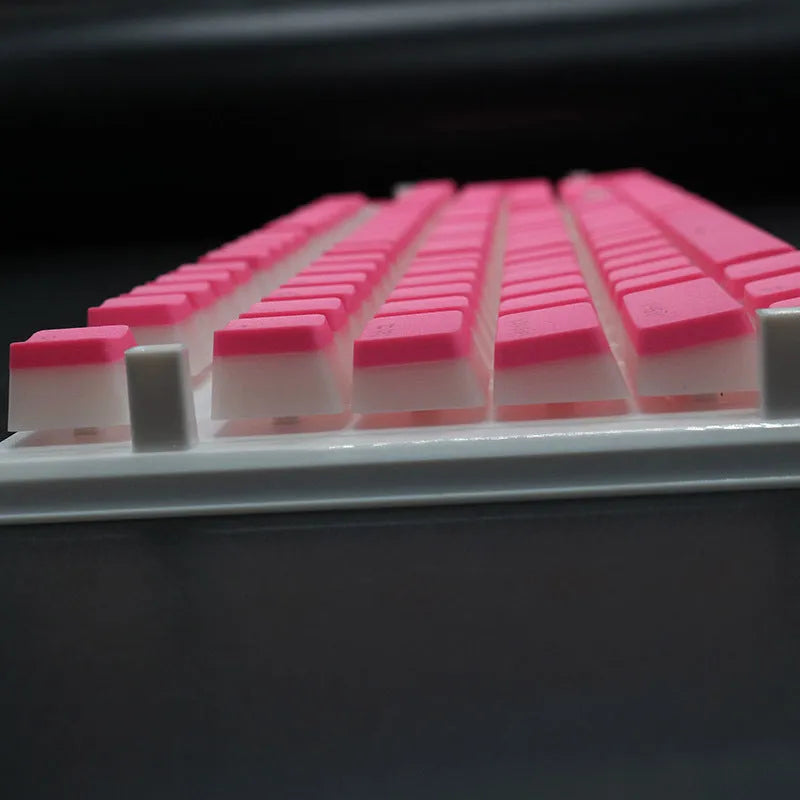 Set of 108 translucent pudding-style PBT keycaps for mechanical keyboards in assorted colours.