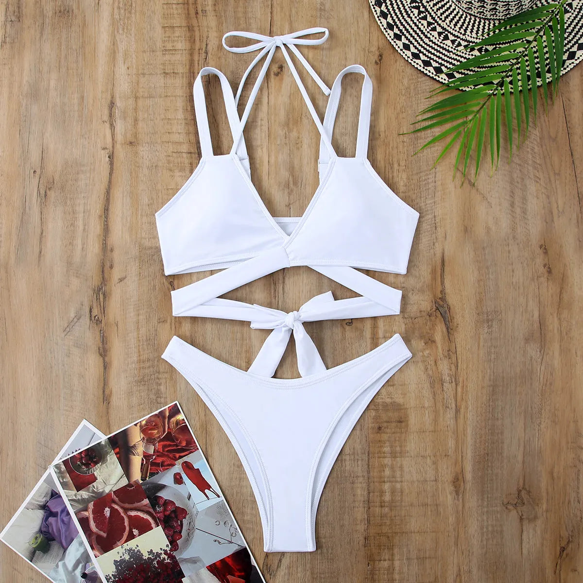 Women's solid colour strap bikini swimsuit in briefs style on a mannequin.