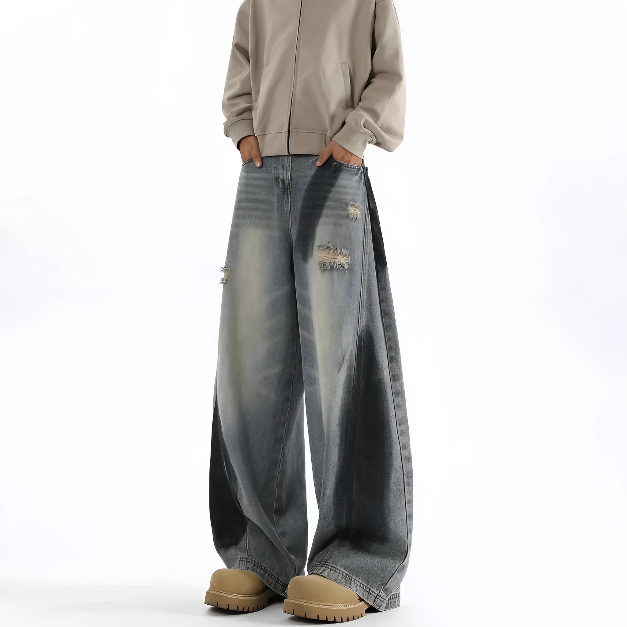 Men's blue ripped jeans with splash-ink wash pattern and loose fit silhouette