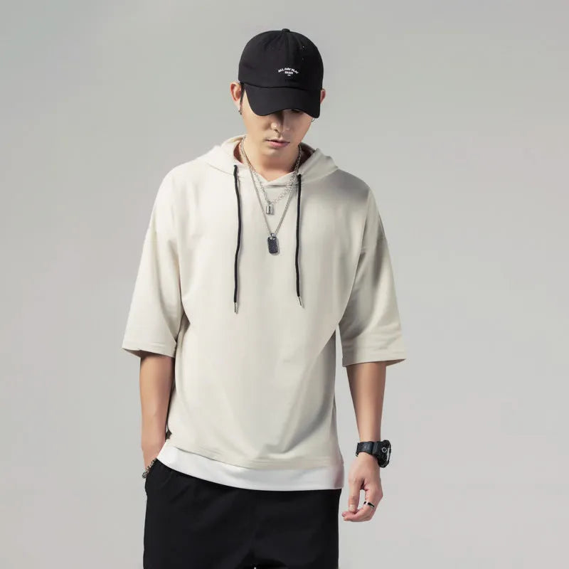 Solid colour loose fit hooded men's short-sleeved T-shirt in black with 3/4 sleeves