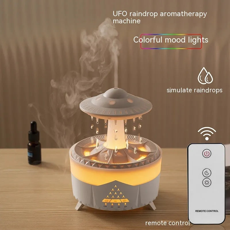 White cloud-shaped UFO raindrop humidifier with water mist and coloured lights
