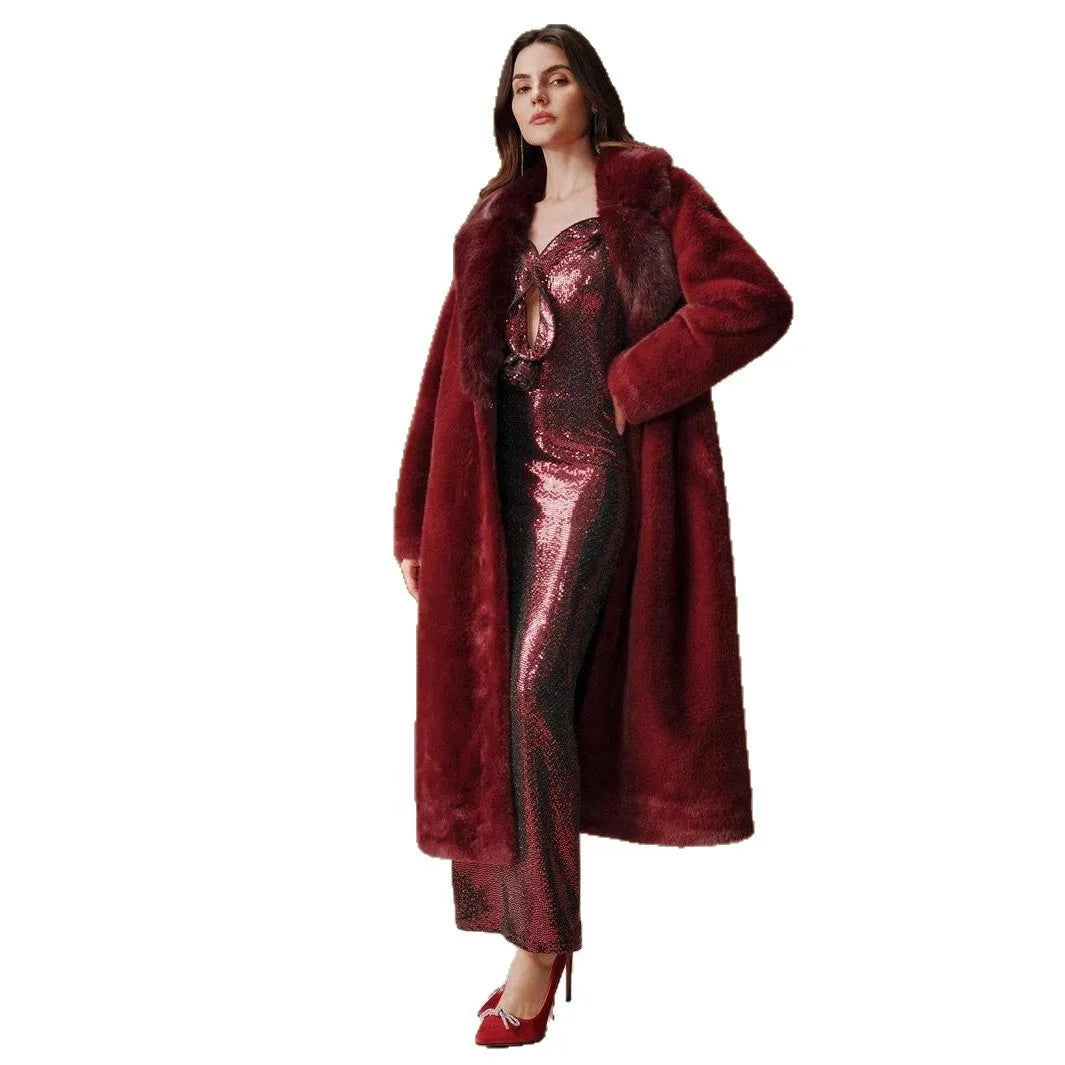 Women's long faux fur coat in camel colour shown from the front.