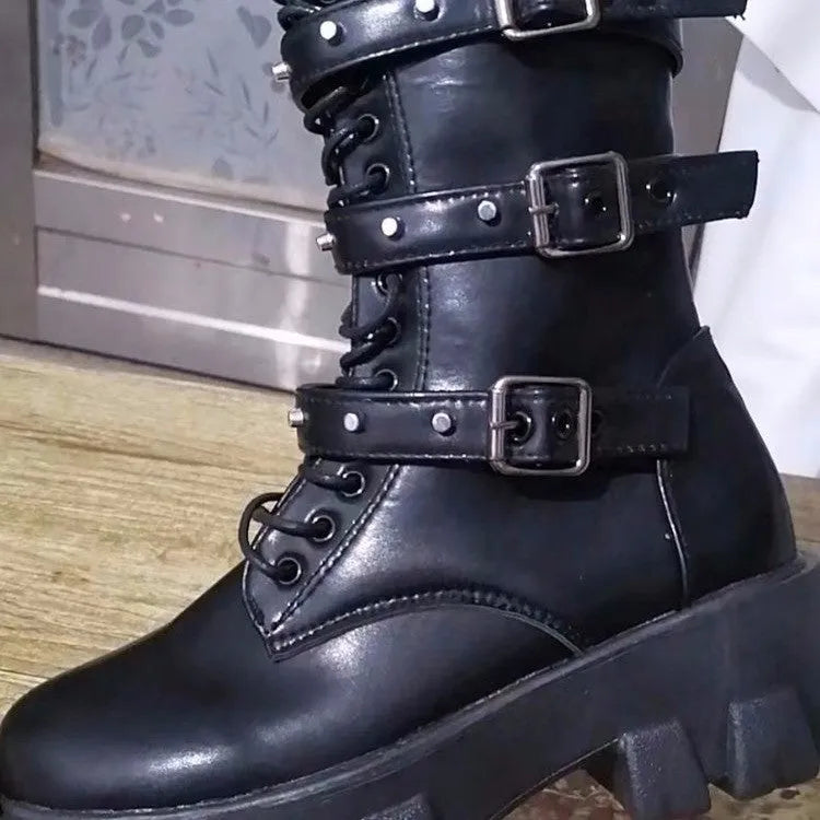Women's black mid-calf knight boots with metal buckle detailing and side zipper