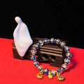 Ancient French Glaze Year Bracelet with geometric glass beads and auspicious patterns in multiple colours.