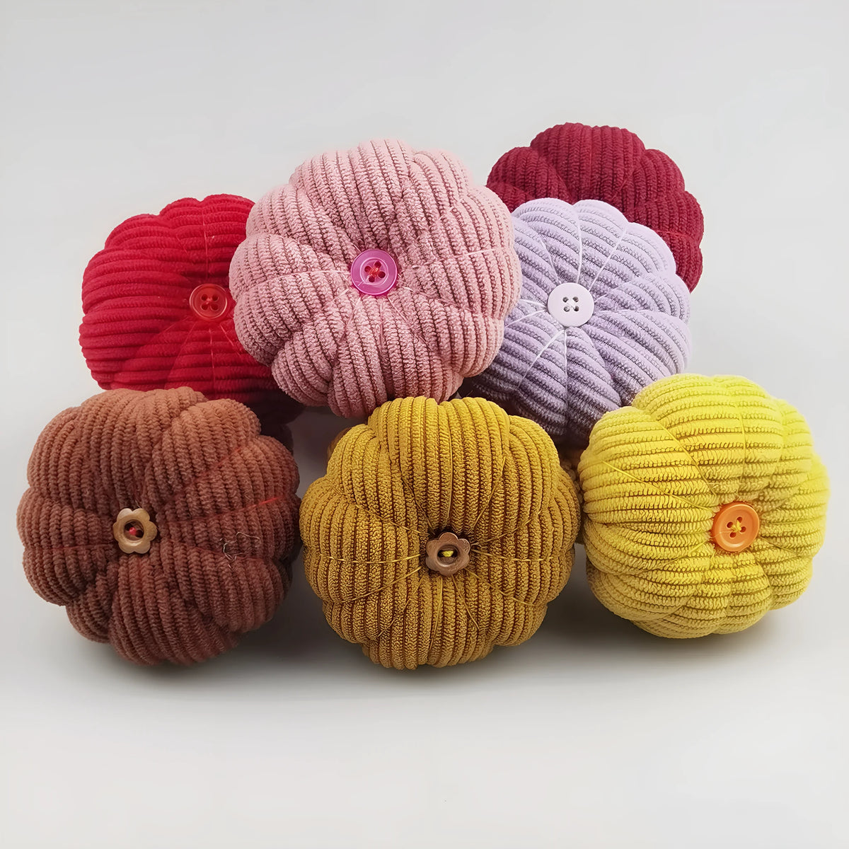Ring pincushion sewing tool with vertical cutting edge in multiple colours