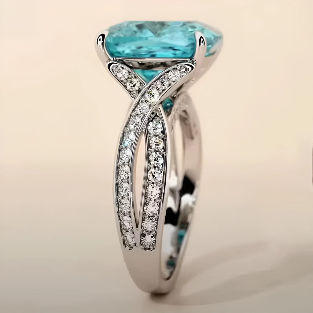 Square blue cubic zirconia women's fashion ring with adjustable metal band on white background