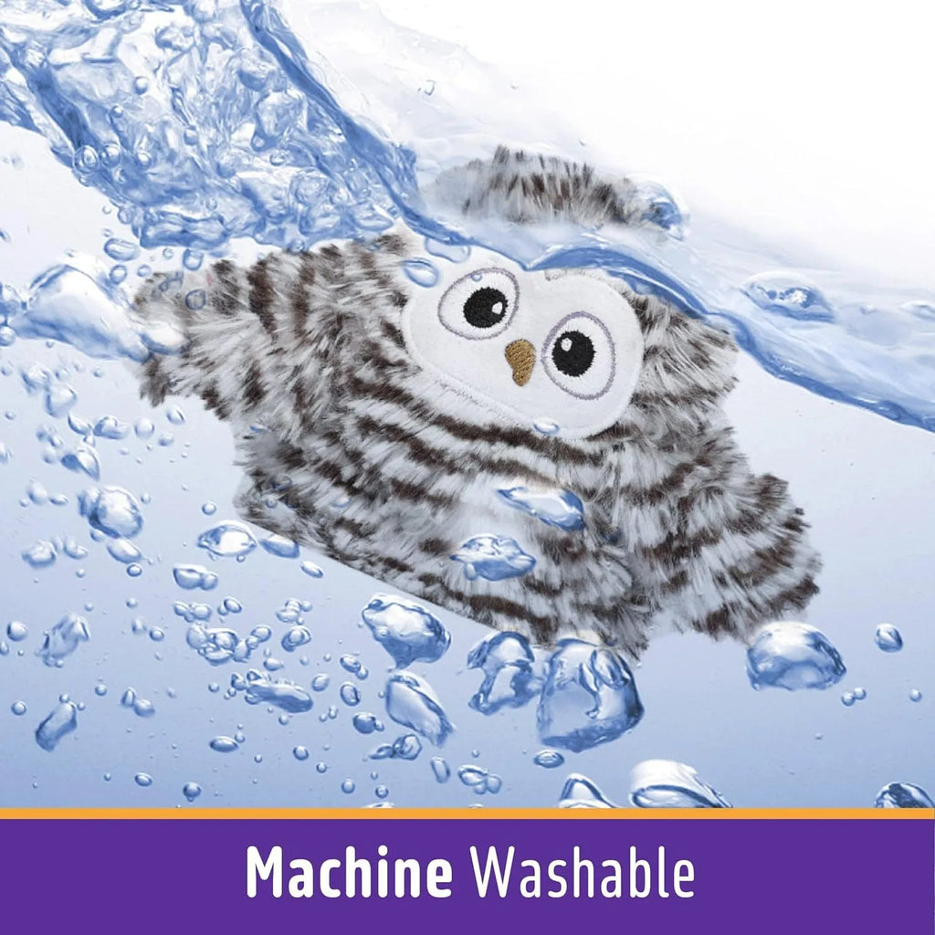 Grey automatic chirping owl cat toy with beating wings on a flat surface.