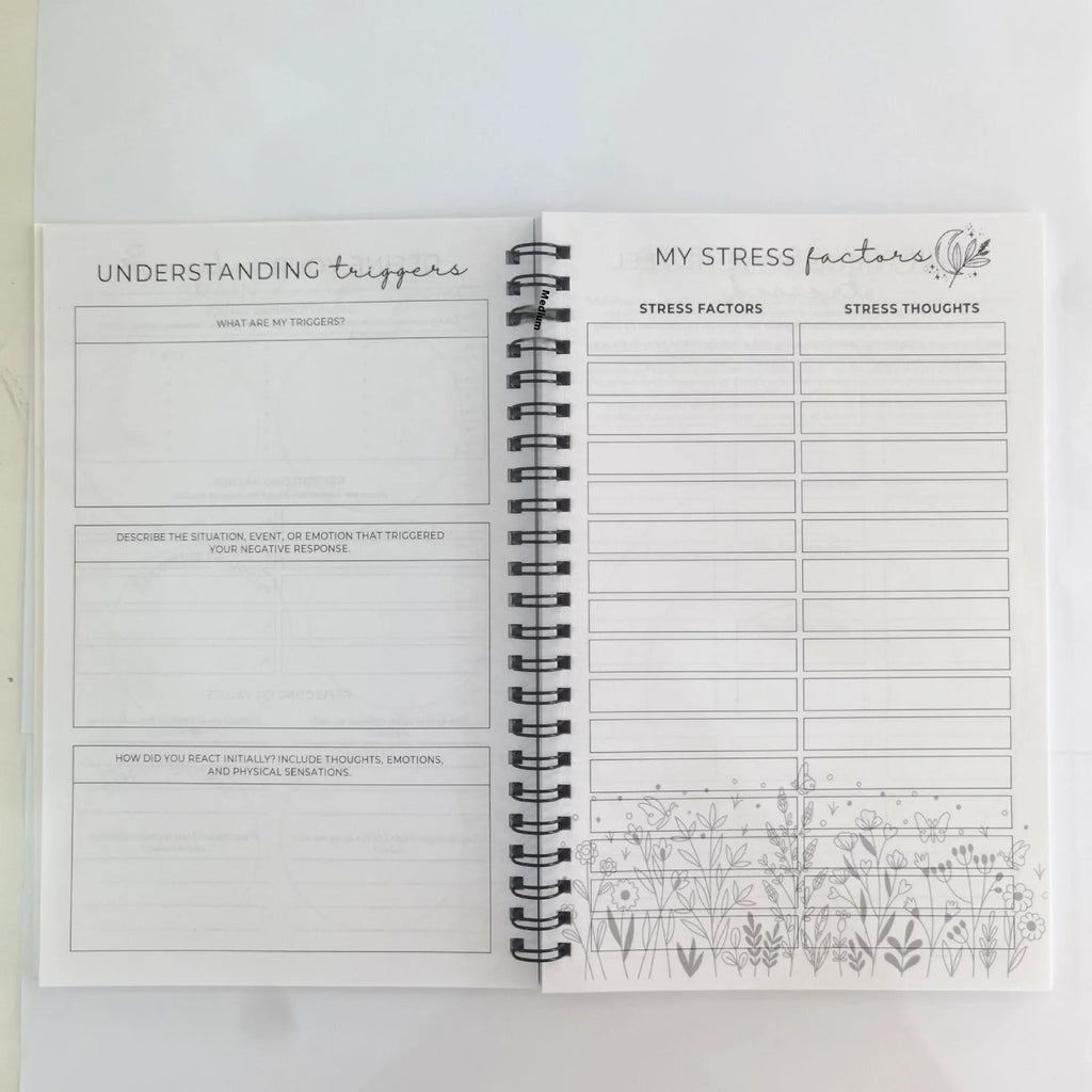 Pink brain mental health planning notepad with coil binding and 80g paper pages