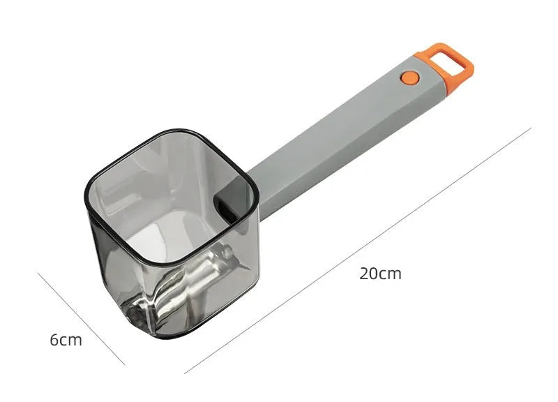 Green, grey, and red stainless steel kitchen peelers with plastic handles on a white background.