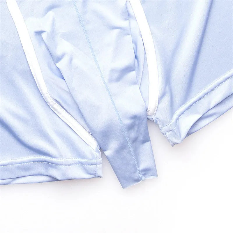 Men's solid colour Ice Silk boxer shorts laid flat, showing mid-waist design in one of six available colours.
