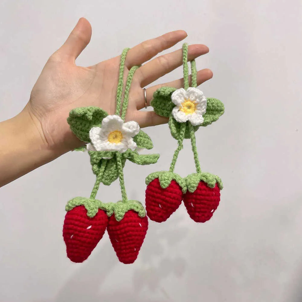 Handmade strawberry-shaped weaving pendant made from cotton and hemp fibres for decorative hanging