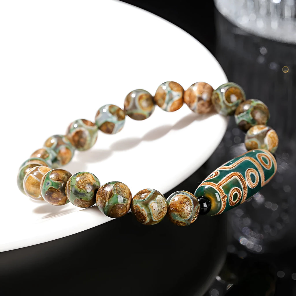Handmade green dzi bead bracelet with barrel-shaped agate beads in unisex national style design