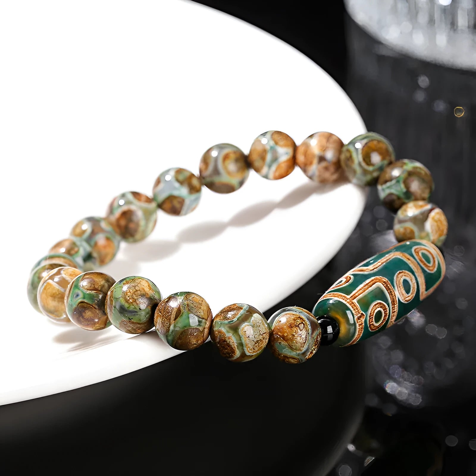 Handmade green dzi bead bracelet with barrel-shaped agate beads in unisex national style design