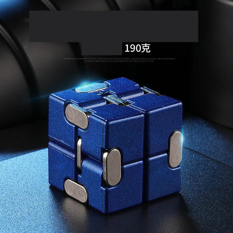 Black zinc alloy infinity cube fidget toy showing eight connected cubes.