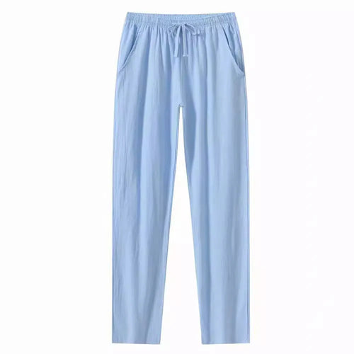 Men's loose-fit cotton beach trousers in solid white, sky blue, khaki, or black colours.