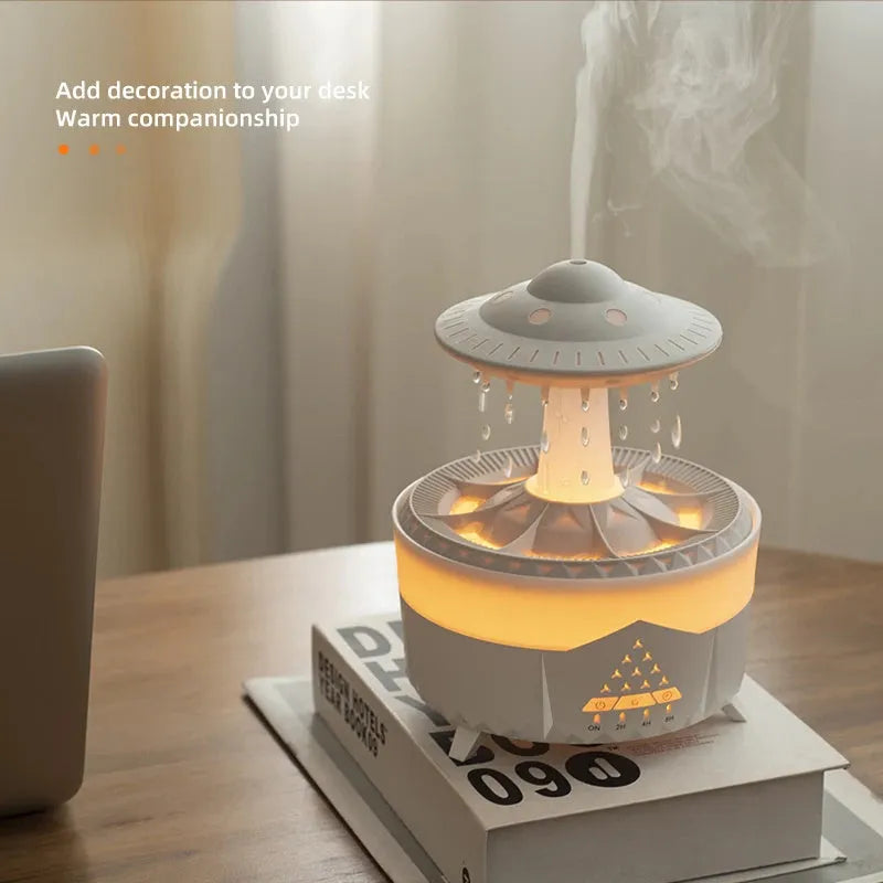 White cloud-shaped UFO raindrop humidifier with water mist and coloured lights