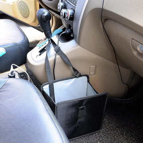 Black car folding trash can made from waterproof Oxford cloth, shown hanging