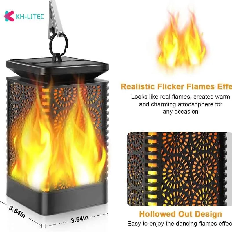 Set of four black solar-powered flame effect LED lanterns for outdoor garden decoration.