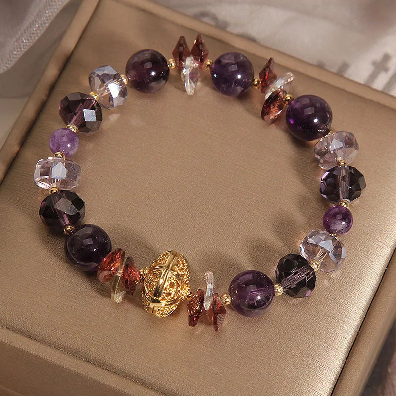 Purple crystal women's bracelet with pumpkin, wind chime, and lucky bead design featuring rhinestone details