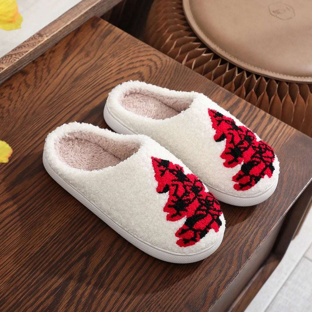 Pair of Christmas tree patterned slippers with plush upper and plastic non-slip sole