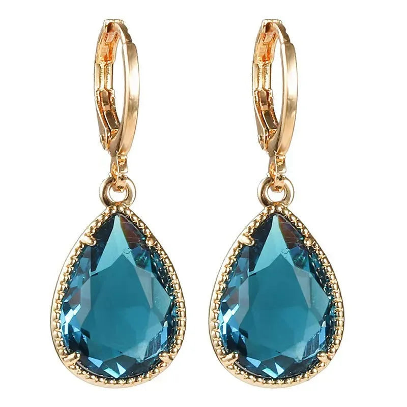 Geometric glass water drop earrings with carved Saturn design in multiple colours