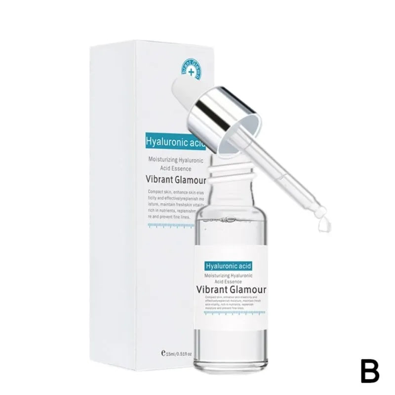 Vitamin C serum set with two 30ml bottles and a white facial beauty device on a clean surface